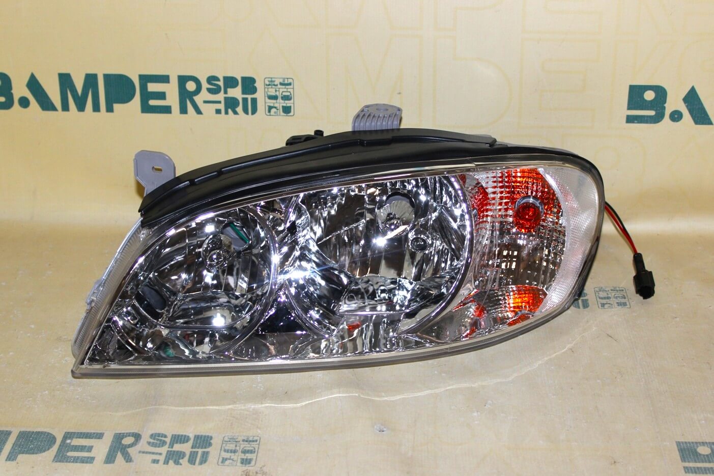 Фара Kia Spectra левая А.