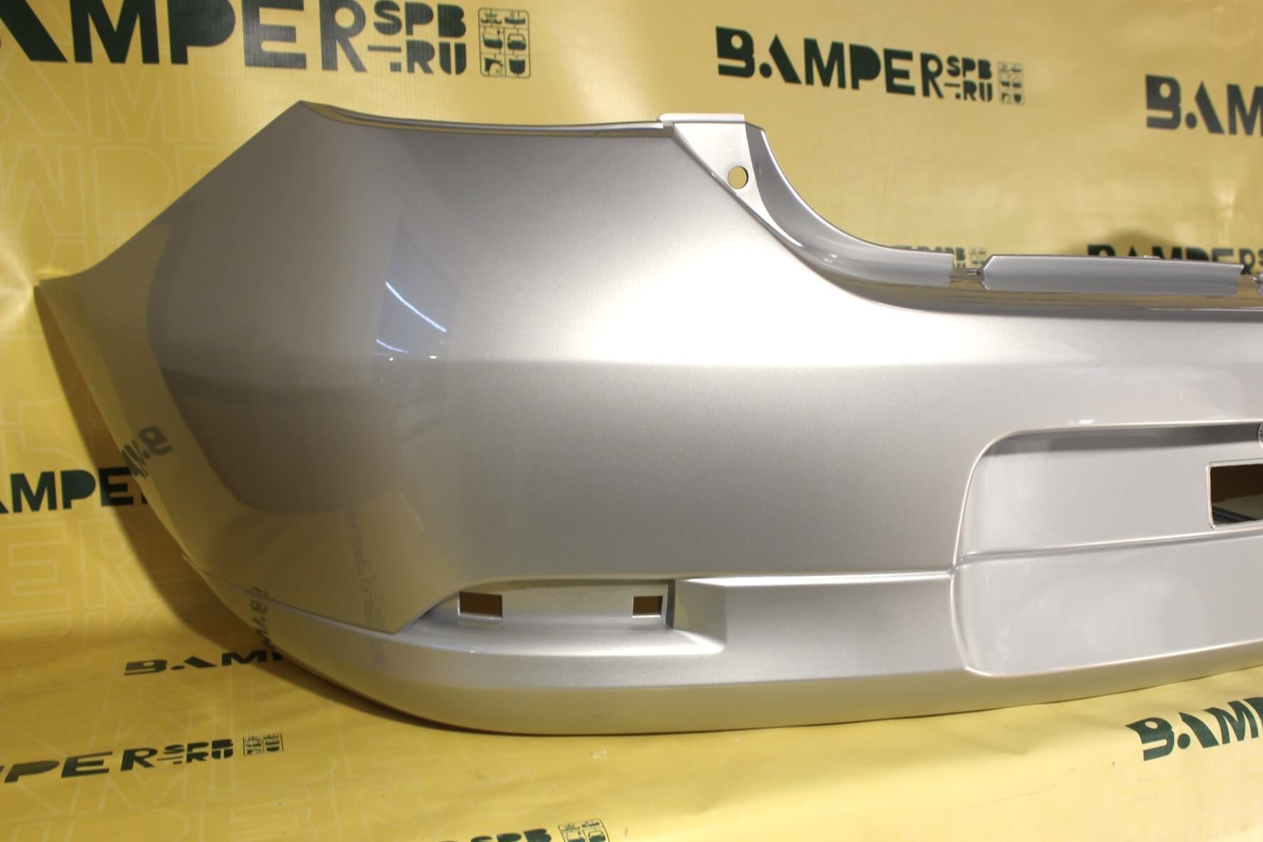 Бампер задний Renault Logan 2 2014-2021 D69 Gris Platine Серебристый